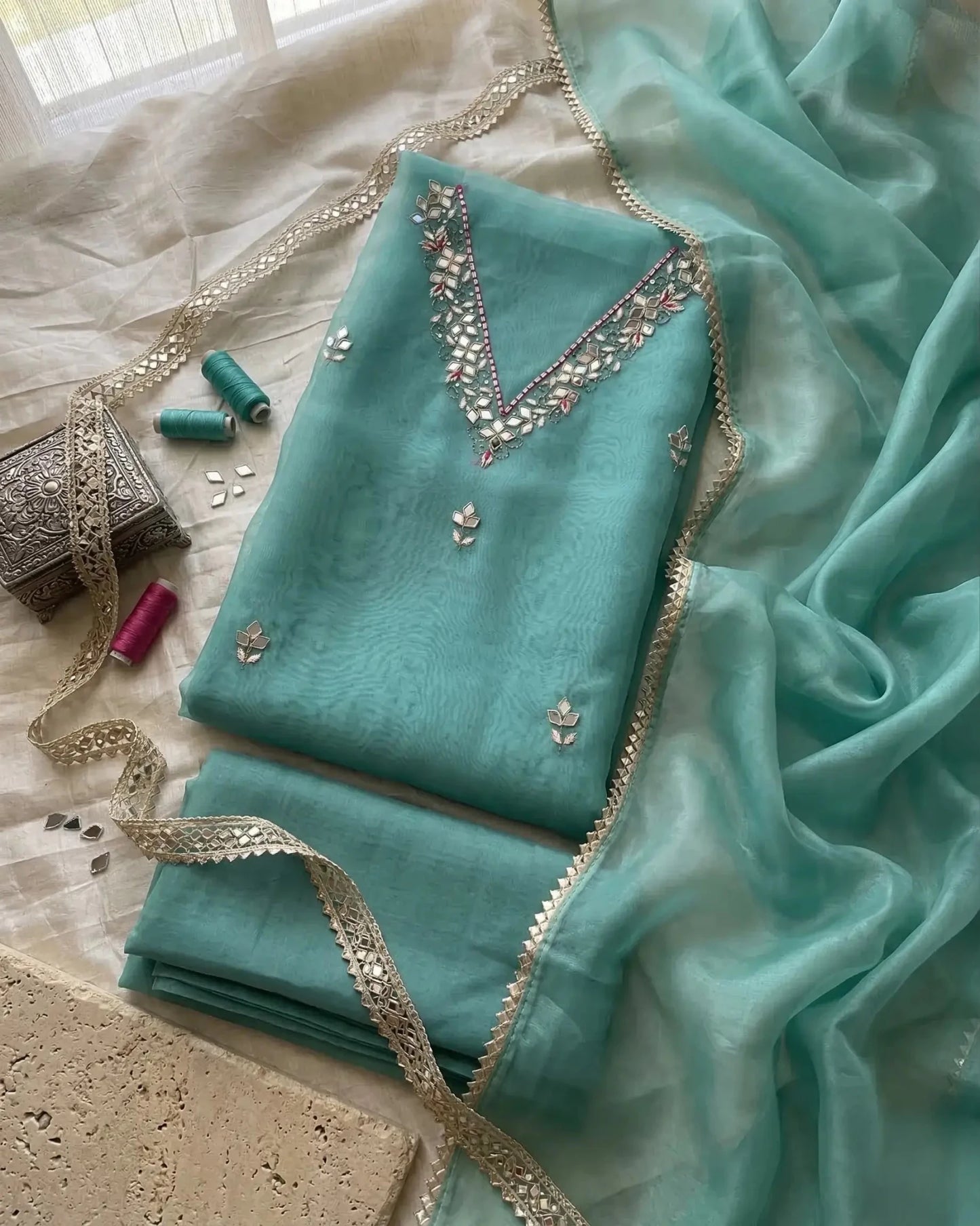 Hand - crafted Handcrafted Firozi Colour Organza Salwar Kameez : Mirror Work, Punjabi Suit for Weddings with elegant handwork - LIBASTINO